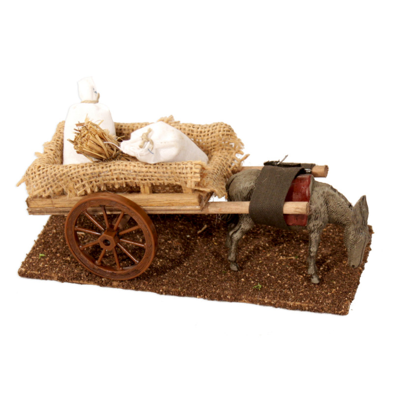 Décor village provençal : charrette de sacs avec â