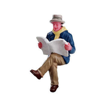 Figurine Lire le journal